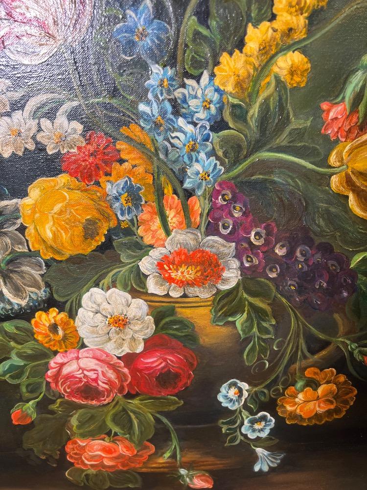 A pair of floral stillifes ( oil on canvas )