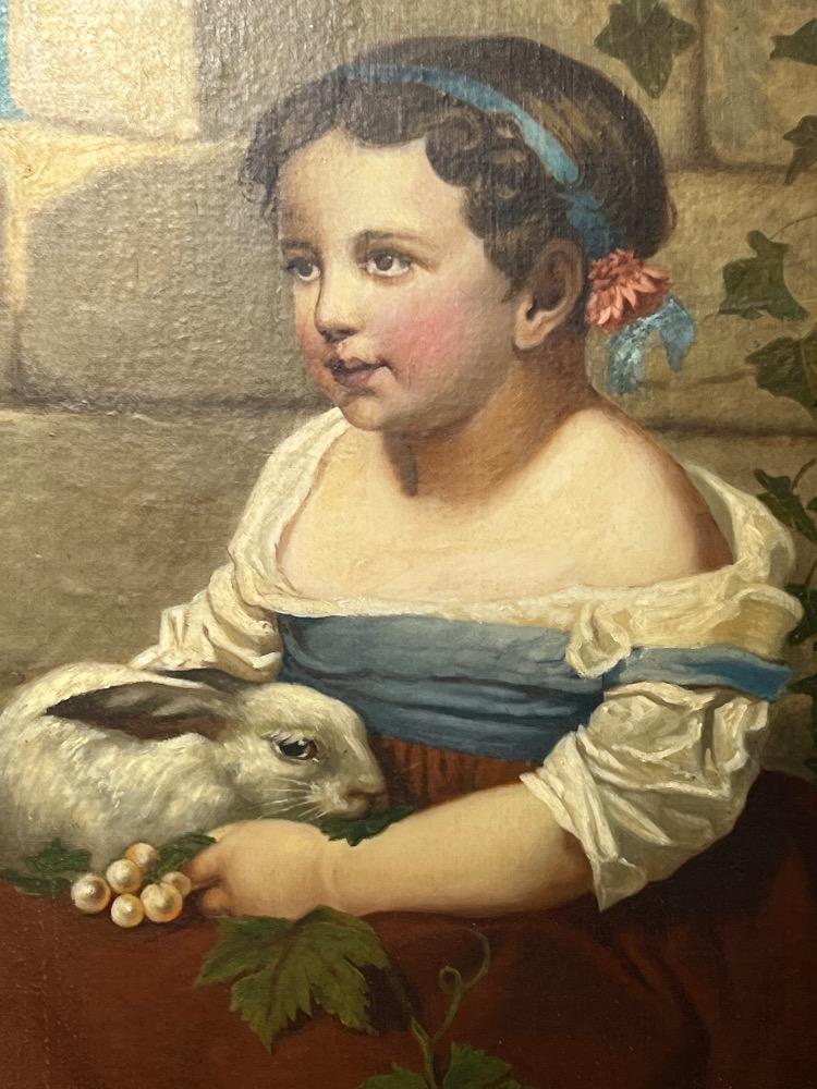 The girl with her rabbit ( oil on canvas on panel )